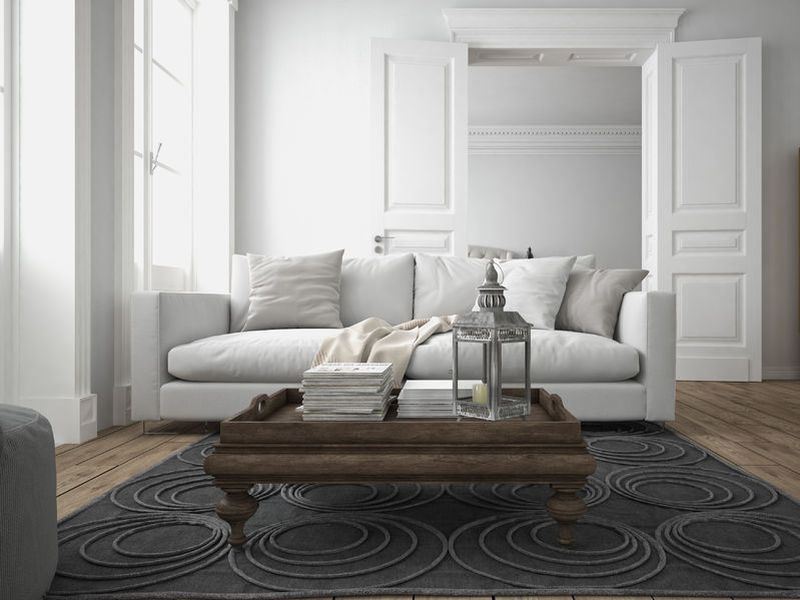 44128125 - sofa of tissue in a modern living room. 3d rendering
