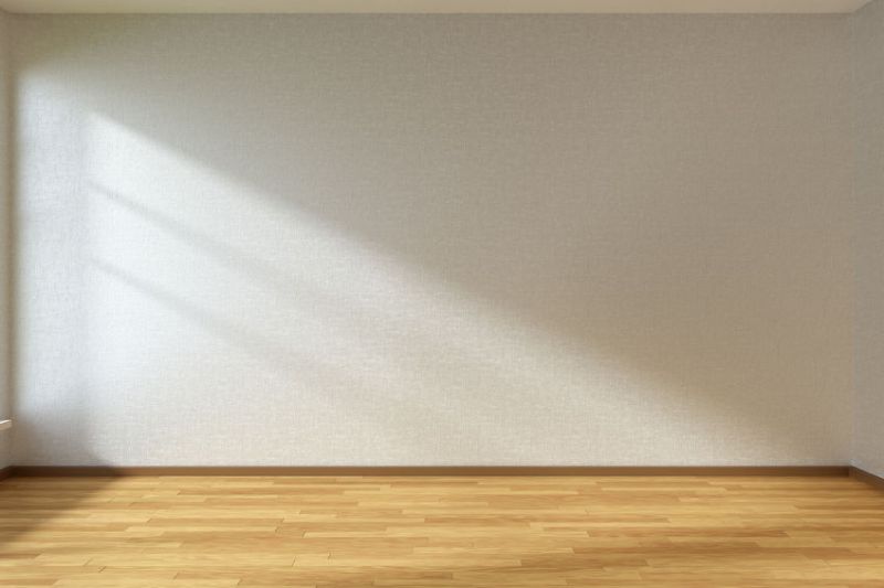 36424008 - empty room with white walls and wooden parquet floor under sun light through window