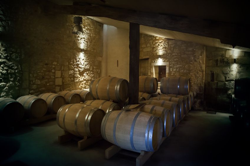 15064122 - row of wine barrels in old winery