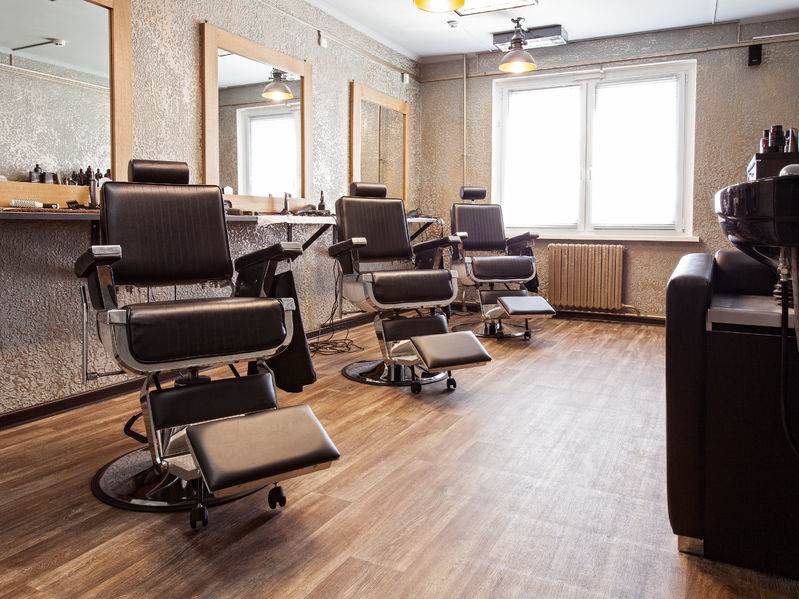 58154029 - hairdressing salon. interior of a barbershop, armchairs and mirrors